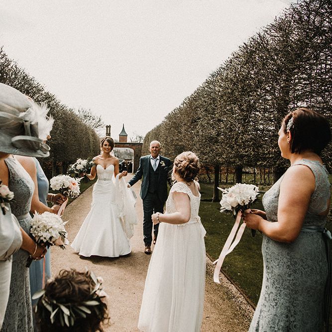 Bridal Entrance in Hourglass Essense of Australia Wedding Dress for a Sophisticated Wedding at Combermere Abbey, Cheshire | Carla Blain Photography