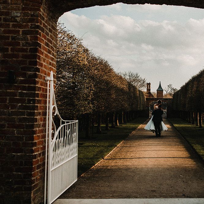 Bride in Hourglass Essense of Australia Gown | Groom in Tweed Suit | Sophisticated Wedding at Combermere Abbey, Cheshire | Carla Blain Photography