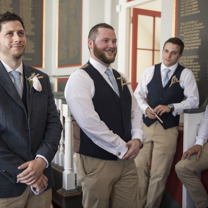 Groom in Blue Jacket and Waistcoat with Camel Chinos | Morris Minor Wedding Car, Hanging Flowers in Bottles and Town Crier for Village Hall Wedding in Rye | Eleanor Jane Photography