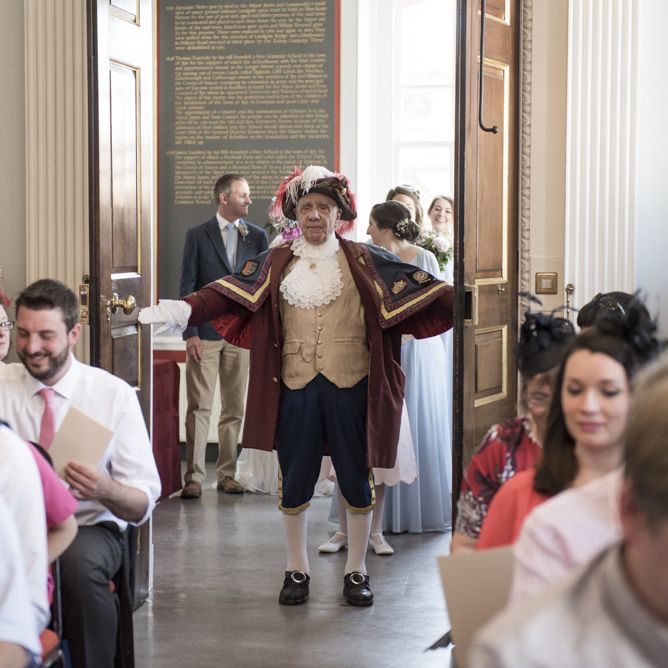 Town Crier at Rye Town Hall, East Sussex | Morris Minor Wedding Car, Hanging Flowers in Bottles and Town Crier for Village Hall Wedding in Rye | Eleanor Jane Photography