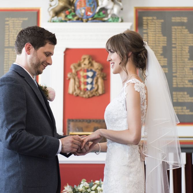 Bride in Lacy Fishtail Stella York Gown with Plunging V Back and Diamante Charm on Champagne Ribbon Belt | Groom in Blue Jacket and Waistcoat with Camel Chinos | Wedding Ceremony at Rye Town Hall | Morris Minor Wedding Car, Hanging Flowers in Bottles and Town Crier for Village Hall Wedding in Rye | Eleanor Jane Photography