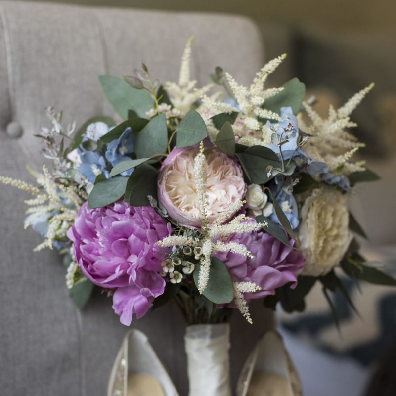 Summer Bridal Bouquet with Purple and Blue Flowers and Eucalyptus | Floral Embroidered Chloe Shoes by Bella Belle | Morris Minor Wedding Car, Hanging Flowers in Bottles and Town Crier for Village Hall Wedding in Rye | Eleanor Jane Photography