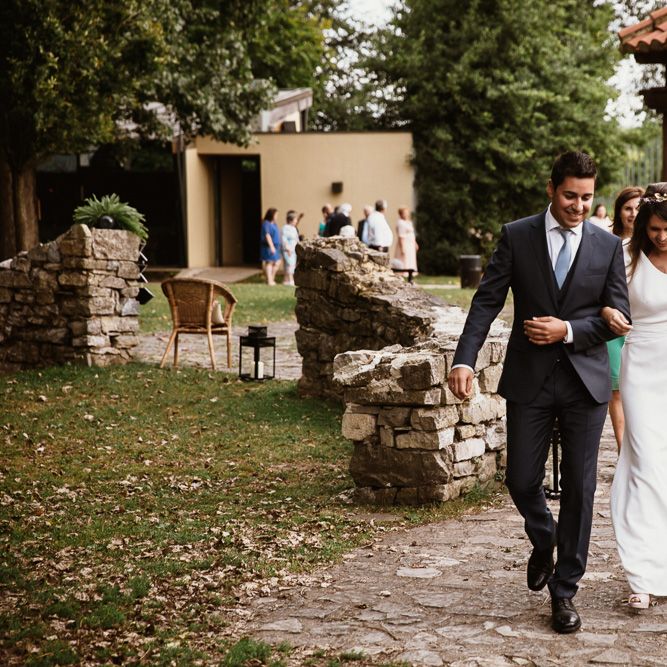 Bride in Nicolás Costura Bridal Gown | Tocados Le Touquet Headpiece | Groom in Navy Suit | Romantic Spanish Wedding at La Salgar Restaurant in Asturias | La Mar Studio Photography