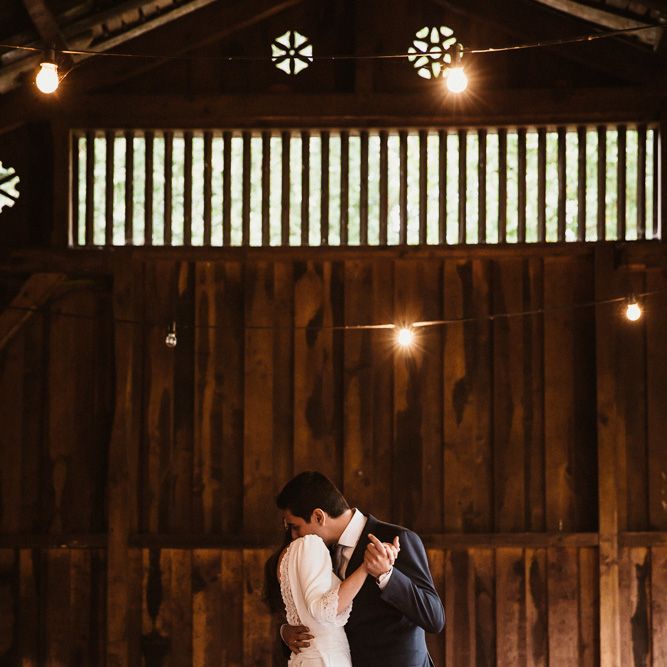 First Dance | Bride in Nicolás Costura Bridal Gown | Tocados Le Touquet Headpiece | Groom in Navy Suit | Romantic Spanish Wedding at La Salgar Restaurant in Asturias | La Mar Studio Photography