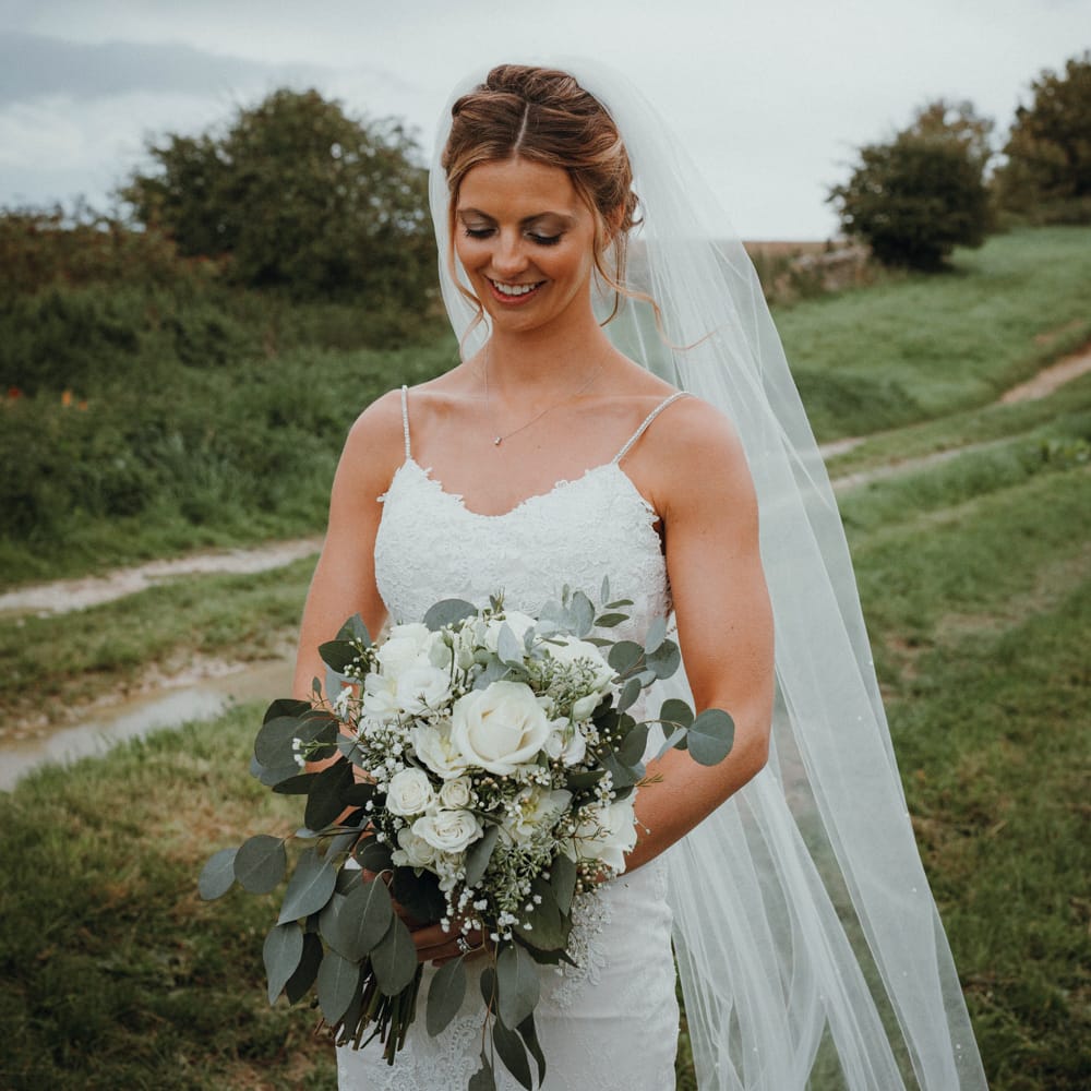 Bride In Enzoani // Glastonbury Themed Table Plan For Wedding At Stone Barn Cotwolds With Groom In Cad &amp; The Dandy Images Meghan Lorna