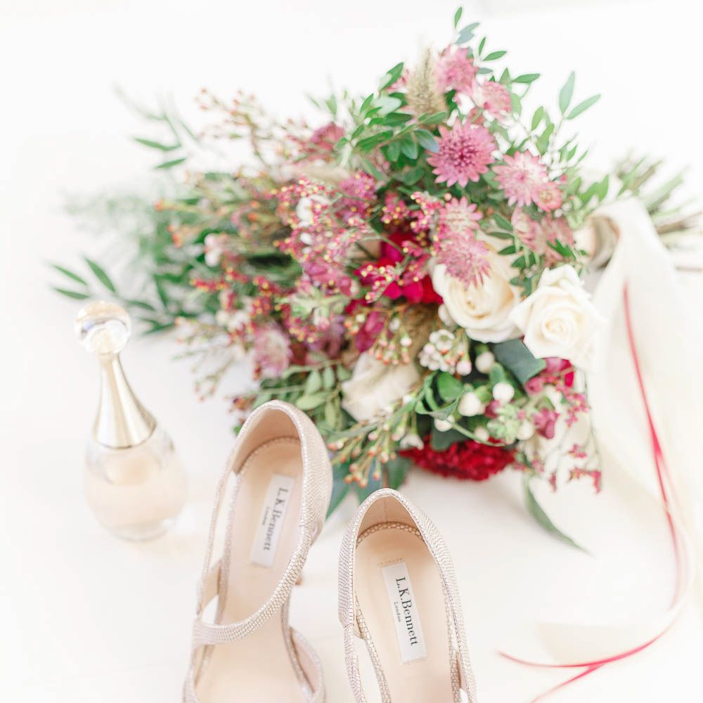 L.K. Bennett Bridal Shoes &amp; Bridal Bouquet | Red New Years Eve Winter Wedding at Iscoyd Park, Shropshire | White Stag Wedding Photography | Lovetwofilm