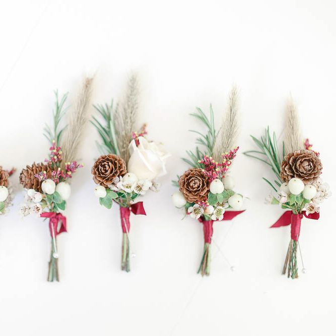 Winter Buttonholes | Red New Years Eve Winter Wedding at Iscoyd Park, Shropshire | White Stag Wedding Photography | Lovetwofilm