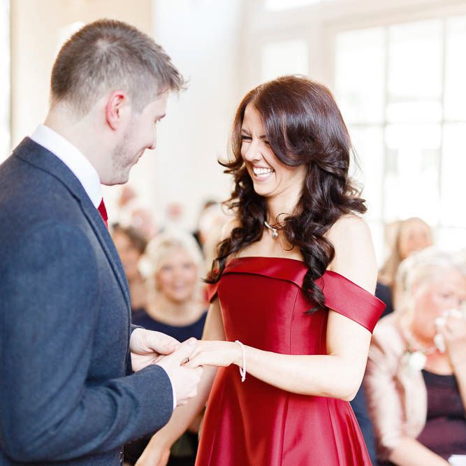 Wedding Ceremony | Bride in Bespoke Red Gown from agape Bridal Boutique | Groom in Slaters Suit | Red New Years Eve Winter Wedding at Iscoyd Park, Shropshire | White Stag Wedding Photography | Lovetwofilm