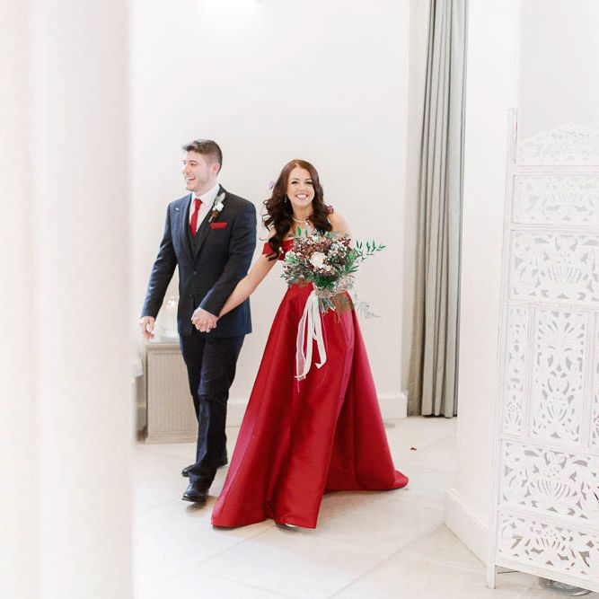 Bride in Bespoke Red Gown from agape Bridal Boutique | Groom in Slaters Suit | Red New Years Eve Winter Wedding at Iscoyd Park, Shropshire | White Stag Wedding Photography | Lovetwofilm