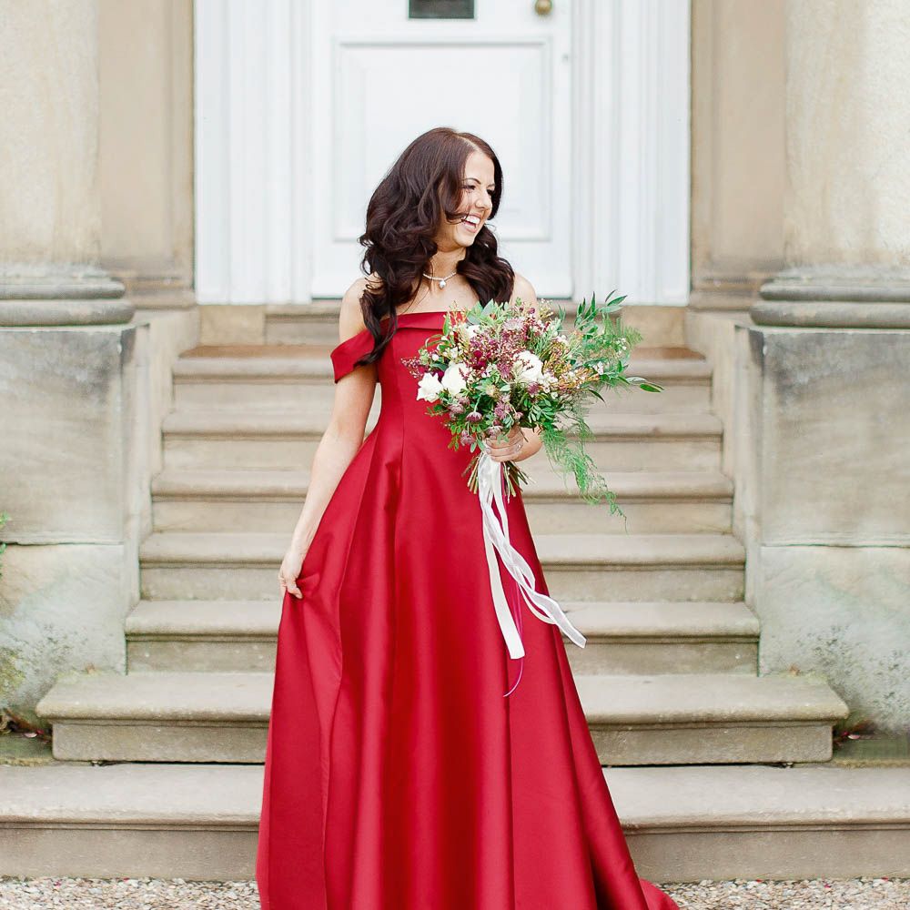 Bride in Bespoke Red Gown from agape Bridal Boutique | Red New Years Eve Winter Wedding at Iscoyd Park, Shropshire | White Stag Wedding Photography | Lovetwofilm
