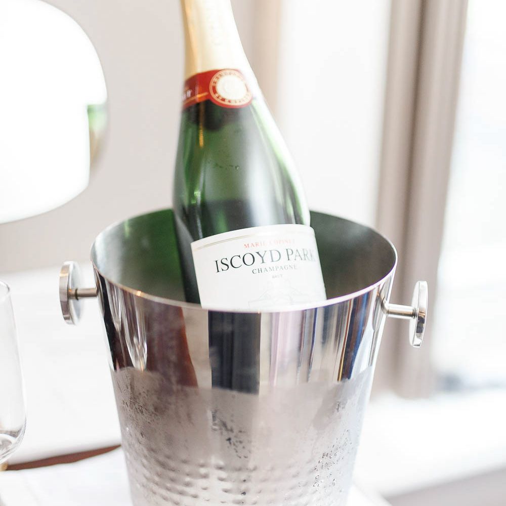 Champagne | Red New Years Eve Winter Wedding at Iscoyd Park, Shropshire | White Stag Wedding Photography | Lovetwofilm