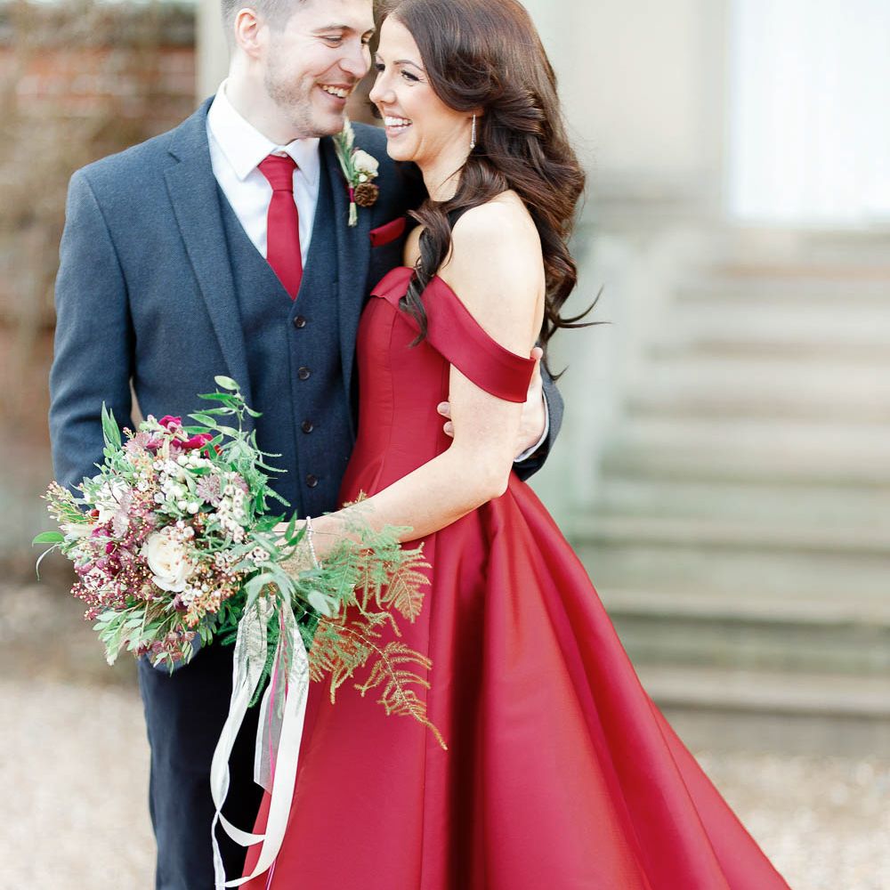 Bride in Bespoke Red Gown from agape Bridal Boutique | Groom in Slaters Suit | Red New Years Eve Winter Wedding at Iscoyd Park, Shropshire | White Stag Wedding Photography | Lovetwofilm