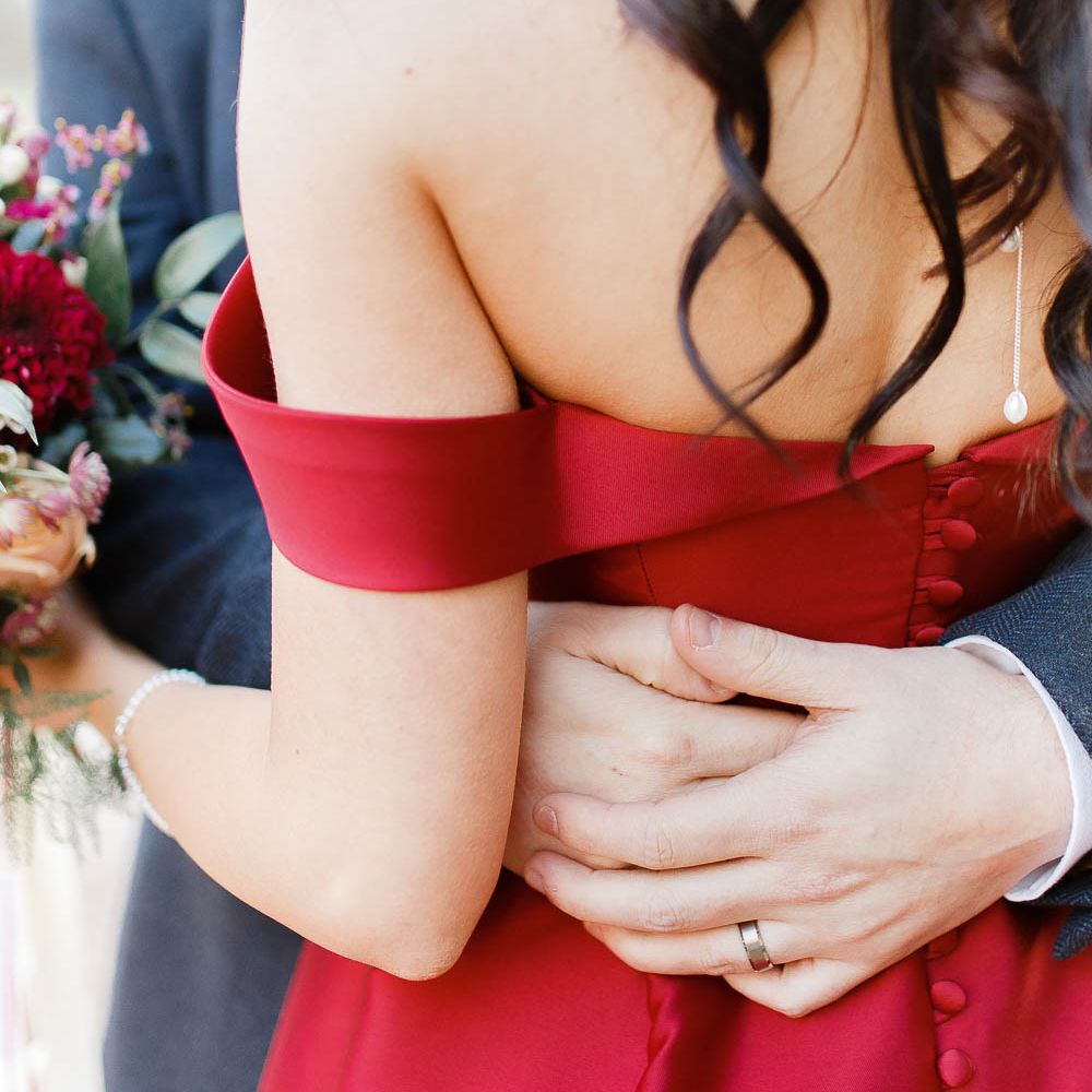 Bride in Bespoke Red Gown from agape Bridal Boutique | Groom in Slaters Suit | Red New Years Eve Winter Wedding at Iscoyd Park, Shropshire | White Stag Wedding Photography | Lovetwofilm