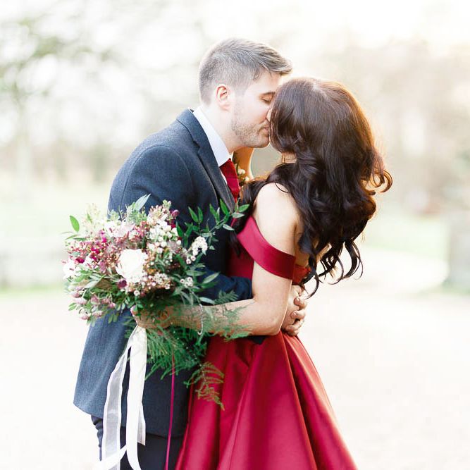 Bride in Bespoke Red Gown from agape Bridal Boutique | Groom in Slaters Suit | Red New Years Eve Winter Wedding at Iscoyd Park, Shropshire | White Stag Wedding Photography | Lovetwofilm