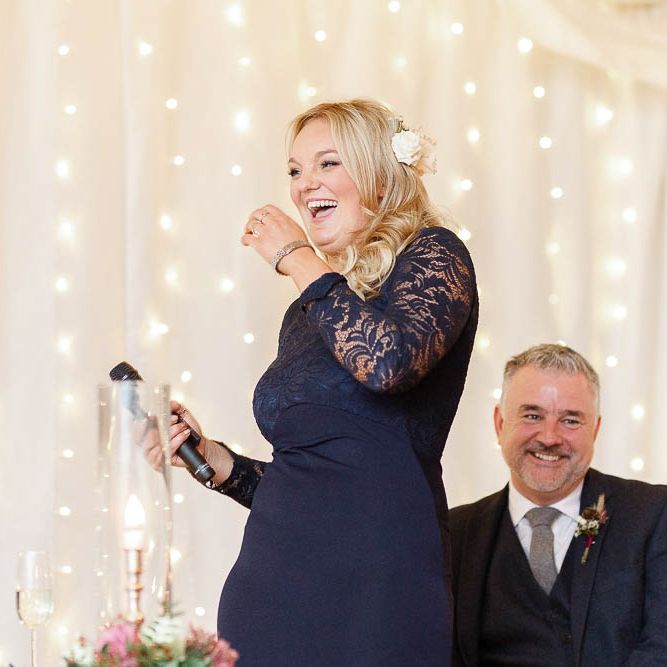 Wedding Reception Speeches | Bridesmaid in Navy Dress | Red New Years Eve Winter Wedding at Iscoyd Park, Shropshire | White Stag Wedding Photography | Lovetwofilm