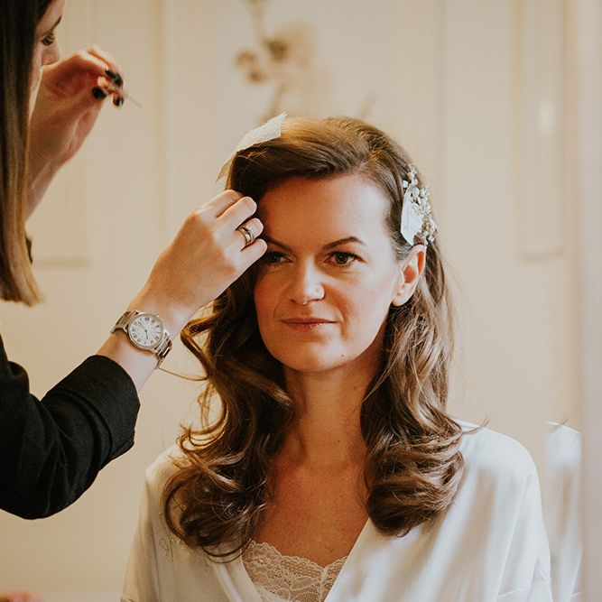 Bride has her hair styled