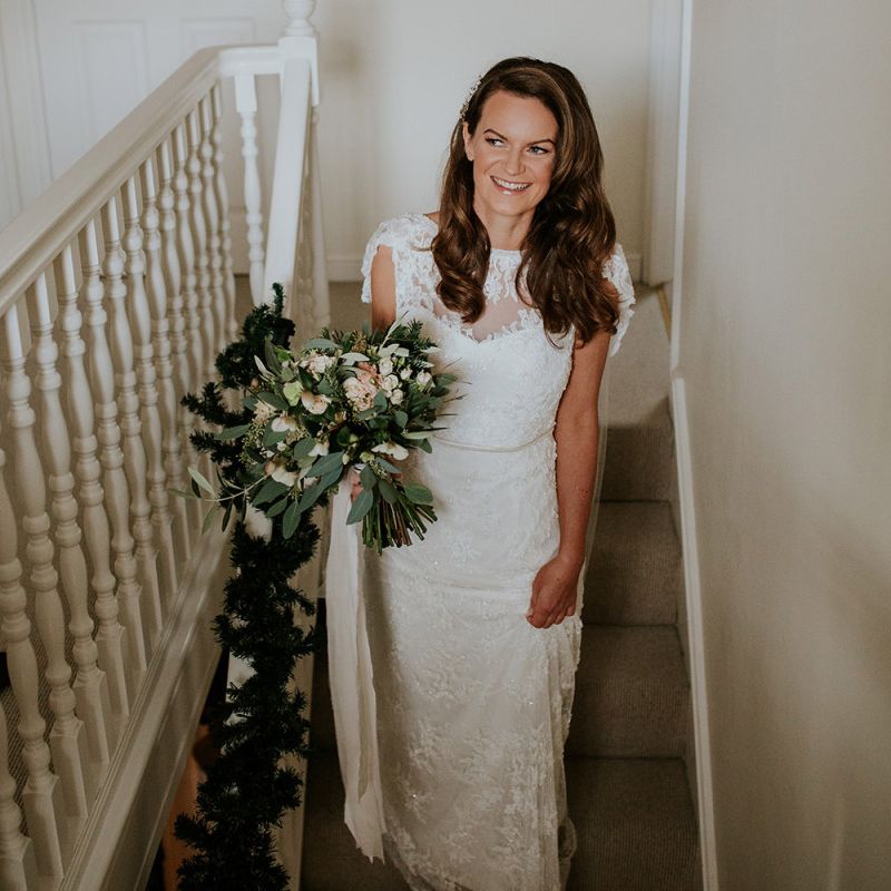Bride makes her way to ceremony at Burley Manor
