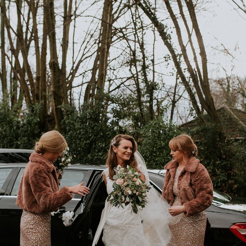 Bride with bridesmaids in cover ups