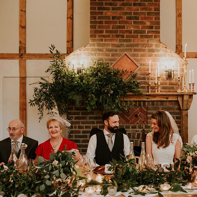 Top table wedding decor with Christmas tree for winter wedding