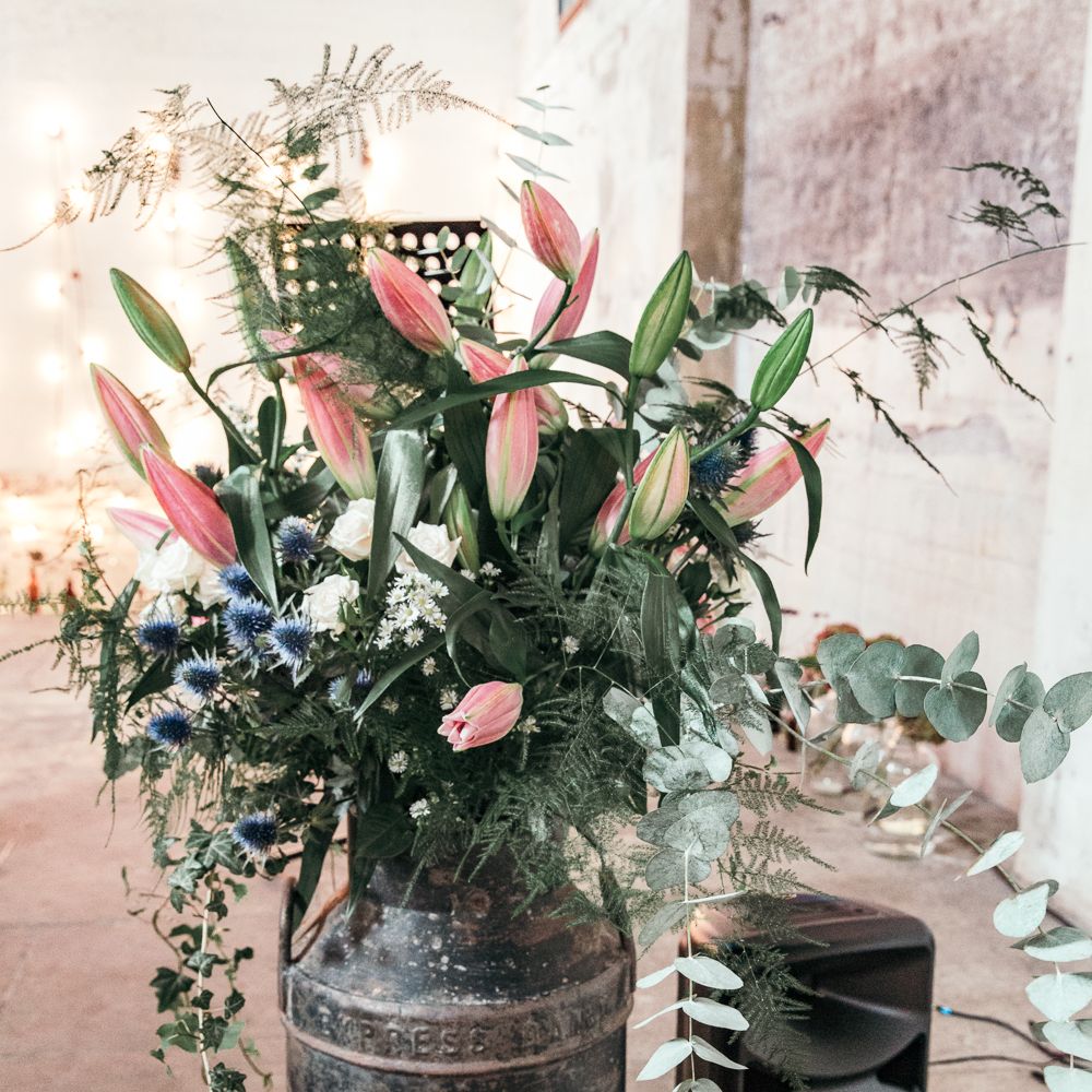Milk Churn For Wedding Flowers // Dry Hire Wedding Venue Dilston Grove London With Bride In Sally Lacock And Groom In Mr Start With Images From Joasis Photography