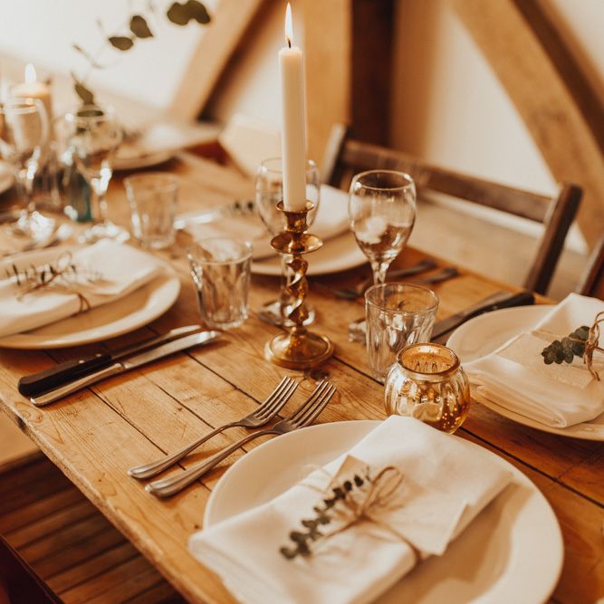 Wedding table decor with gold candlesticks
