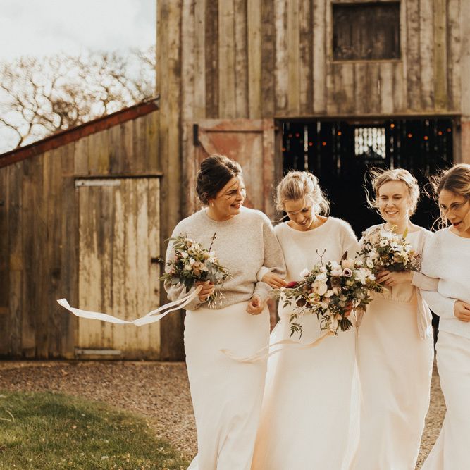 Bridal party wearing jumpers for Winter wedding