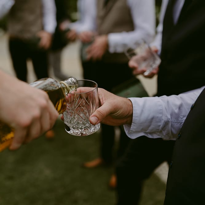 Whiskey Glass | Outdoor Boho Wedding at Chateau le Tour, France | Adam and Grace Photography | Head and Heart Films