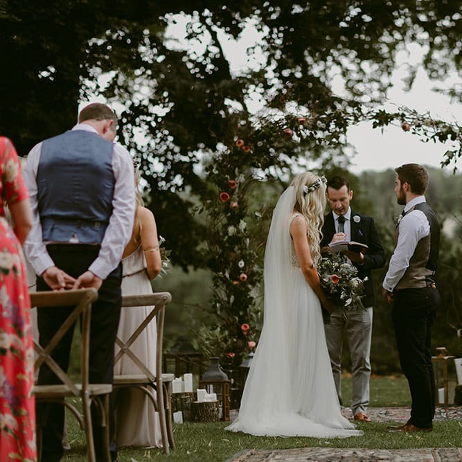 Wedding Ceremony | Floral Arch | Outdoor Boho Wedding at Chateau le Tour, France | Adam and Grace Photography | Head and Heart Films