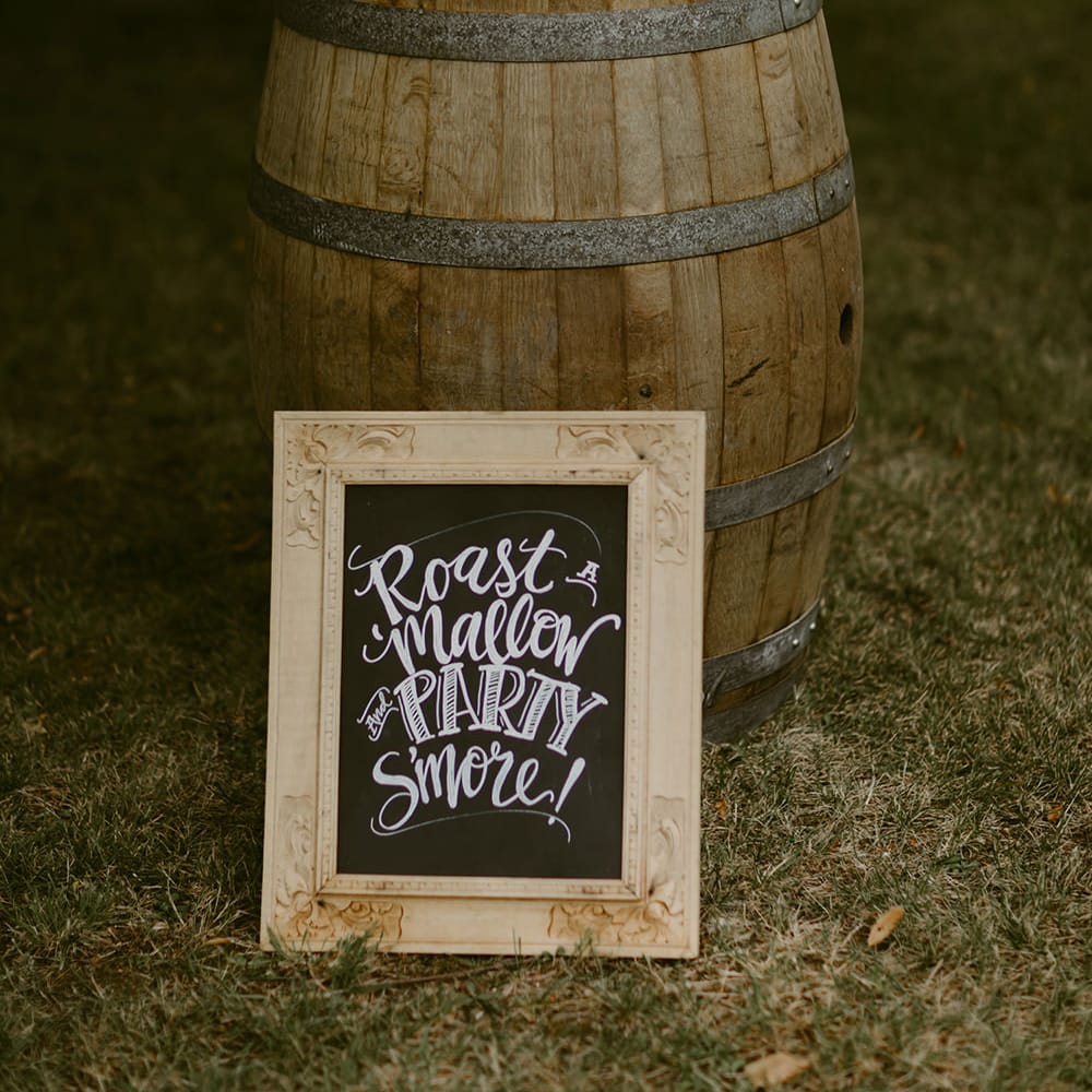 Smore's Dessert Station | Festoon Lit Outdoor Boho Wedding at Chateau le Tour, France | Adam and Grace Photography | Head and Heart Films