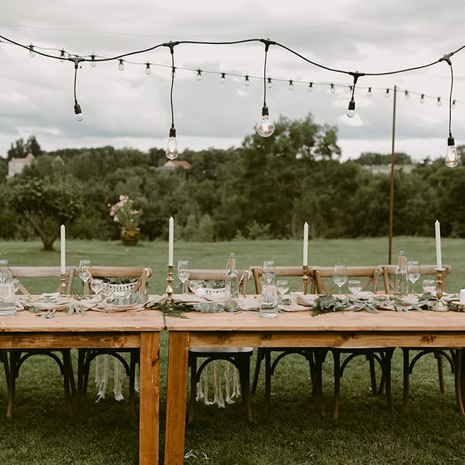 Trestle Tablescape | Festoon Lit Outdoor Boho Wedding at Chateau le Tour, France | Adam and Grace Photography | Head and Heart Films