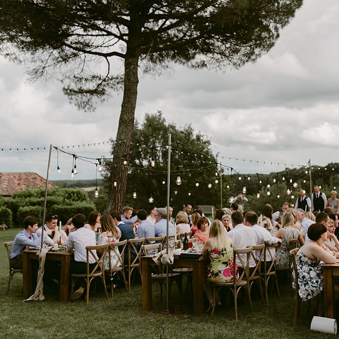 Festoon Lit Outdoor Boho Wedding at Chateau le Tour, France | Adam and Grace Photography | Head and Heart Films