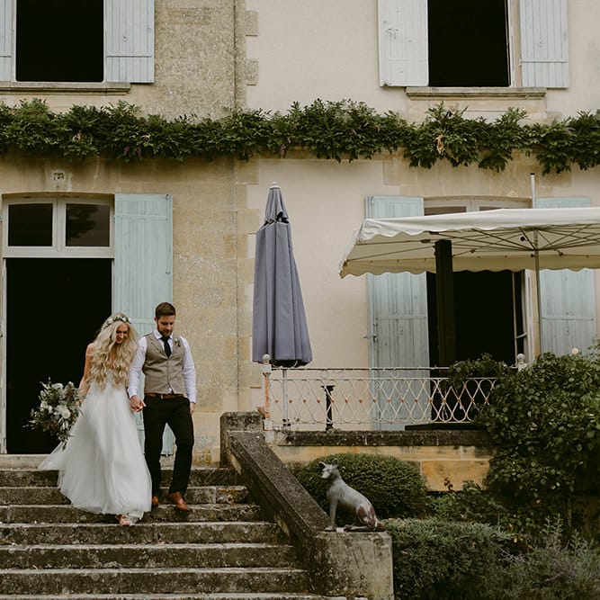 Bride in Daalarna Bridal Gown | Groom in Waistcoat | Festoon Lit Outdoor Boho Wedding at Chateau le Tour, France | Adam and Grace Photography | Head and Heart Films
