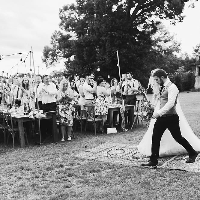 Bride in Daalarna Bridal Gown | Groom in Waistcoat | Festoon Lit Outdoor Boho Wedding at Chateau le Tour, France | Adam and Grace Photography | Head and Heart Films