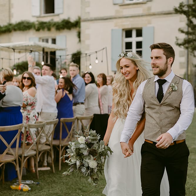 Bride in Daalarna Bridal Gown | Groom in Waistcoat | Festoon Lit Outdoor Boho Wedding at Chateau le Tour, France | Adam and Grace Photography | Head and Heart Films