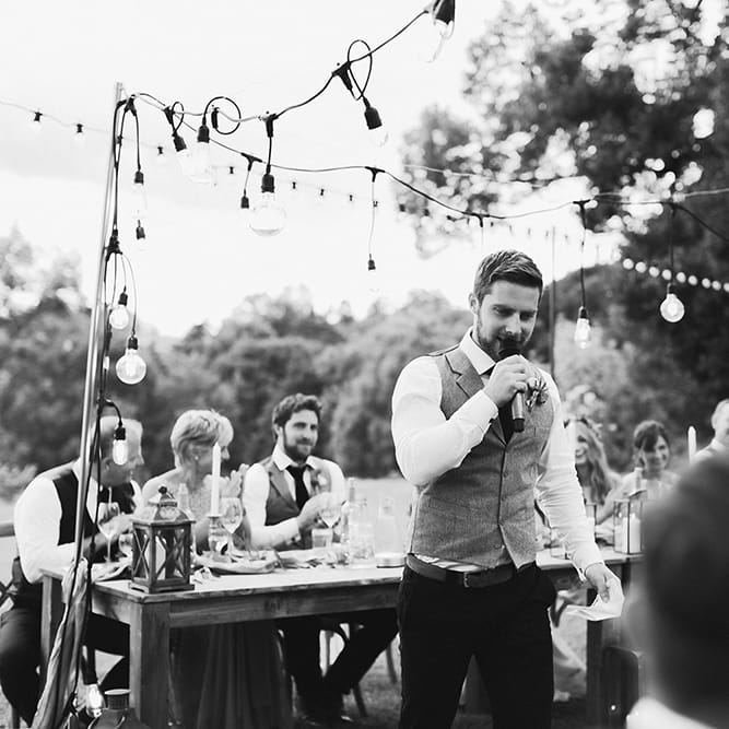 Wedding Speeches | Groom in Waistcoat | Festoon Lit Outdoor Boho Wedding at Chateau le Tour, France | Adam and Grace Photography | Head and Heart Films