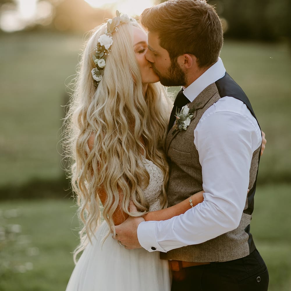 Bride in Daalarna Bridal Gown with Mermaid Hair | Groom in Waistcoat | Outdoor Boho Wedding at Chateau le Tour, France | Adam and Grace Photography | Head and Heart Films