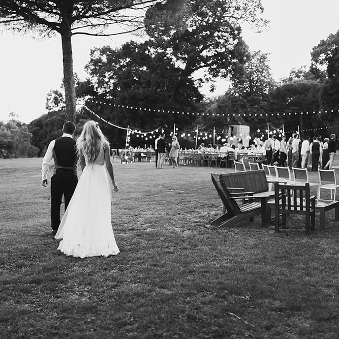 Bride in Daalarna Bridal Gown | Groom in Waistcoat | Festoon Lit Outdoor Boho Wedding at Chateau le Tour, France | Adam and Grace Photography | Head and Heart Films