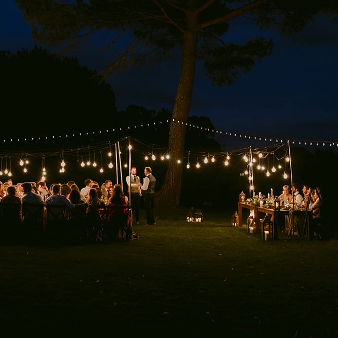 Festoon Lit Outdoor Boho Wedding at Chateau le Tour, France | Adam and Grace Photography | Head and Heart Films