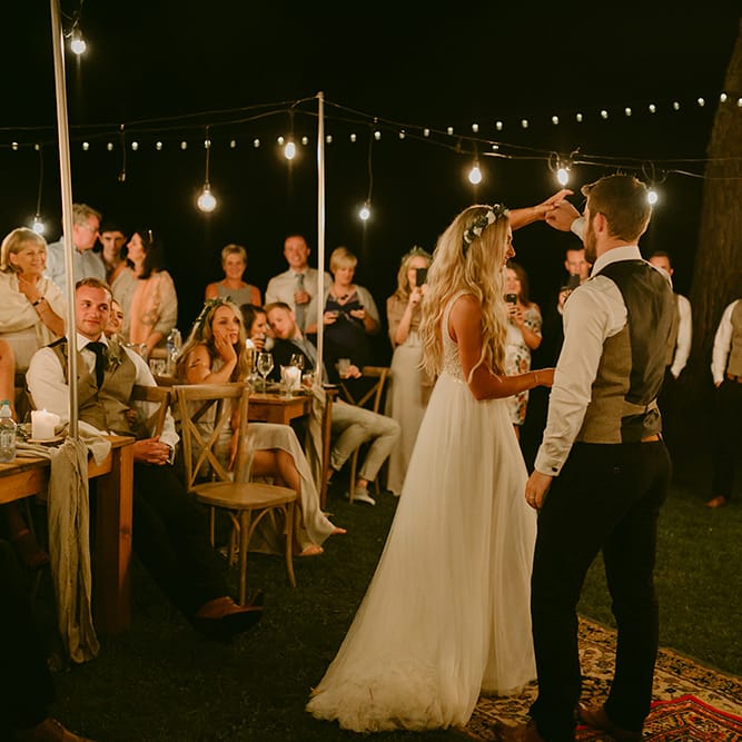 Bride in Daalarna Bridal Gown | Groom in Waistcoat | Festoon Light | Outdoor Boho Wedding at Chateau le Tour, France | Adam and Grace Photography | Head and Heart Films