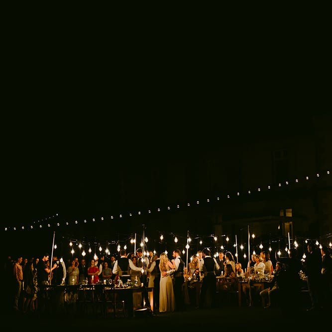 Festoon Lit Outdoor Boho Wedding at Chateau le Tour, France | Adam and Grace Photography | Head and Heart Films