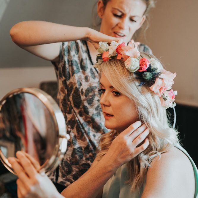 Bright flower crown for bridal party in different bridesmaid dresses