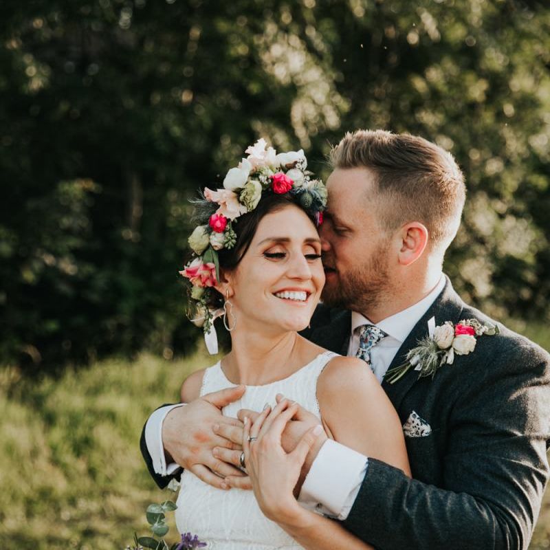 Flower crown for bride with bridal party in different bridesmaid dresses