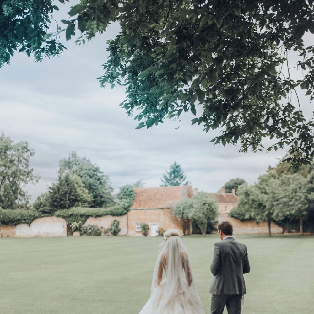 Bride In La Sposa Wedding Dress // Pink Ruffled Chair Covers For Romantic Pastel Pink Wedding At Dorton House With Bride In La Sposa And Images From Julia &amp; You Photography