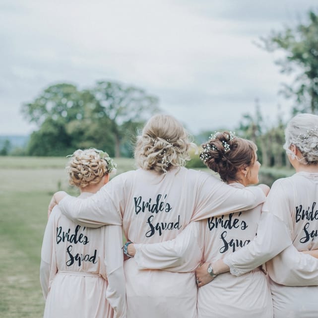 Brides Squad Robes // Pink Ruffled Chair Covers For Romantic Pastel Pink Wedding At Dorton House With Bride In La Sposa And Images From Julia &amp; You Photography