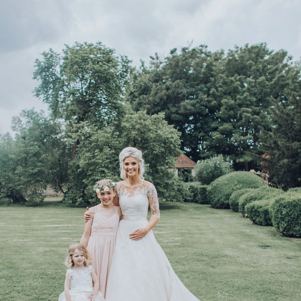 Bride With Bridesmaids // Pink Ruffled Chair Covers For Romantic Pastel Pink Wedding At Dorton House With Bride In La Sposa And Images From Julia &amp; You Photography