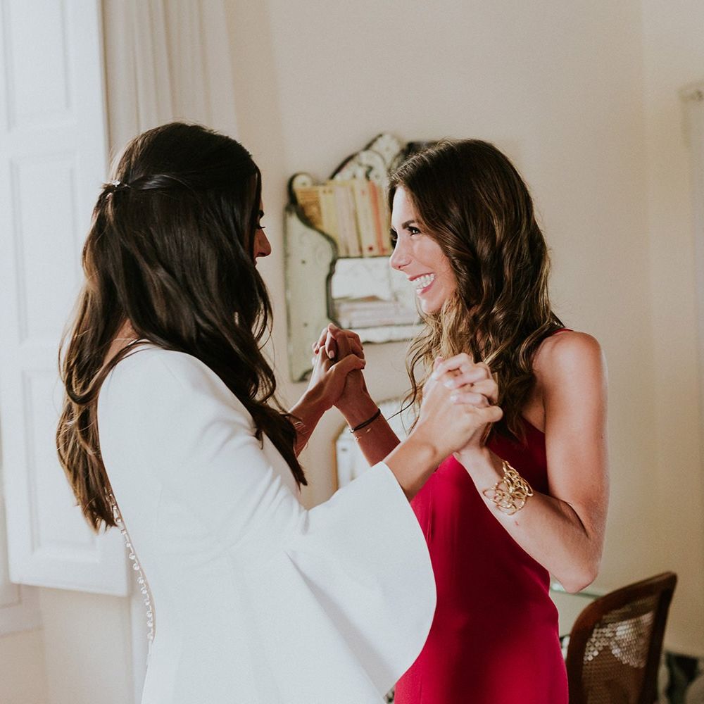 Bride celebrates during preparations for Jewish wedding ceremony