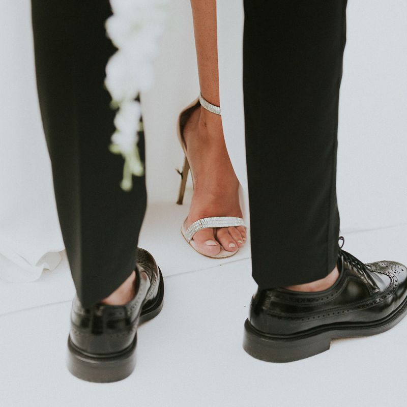 Bride and groom shoes at Jewish wedding ceremony