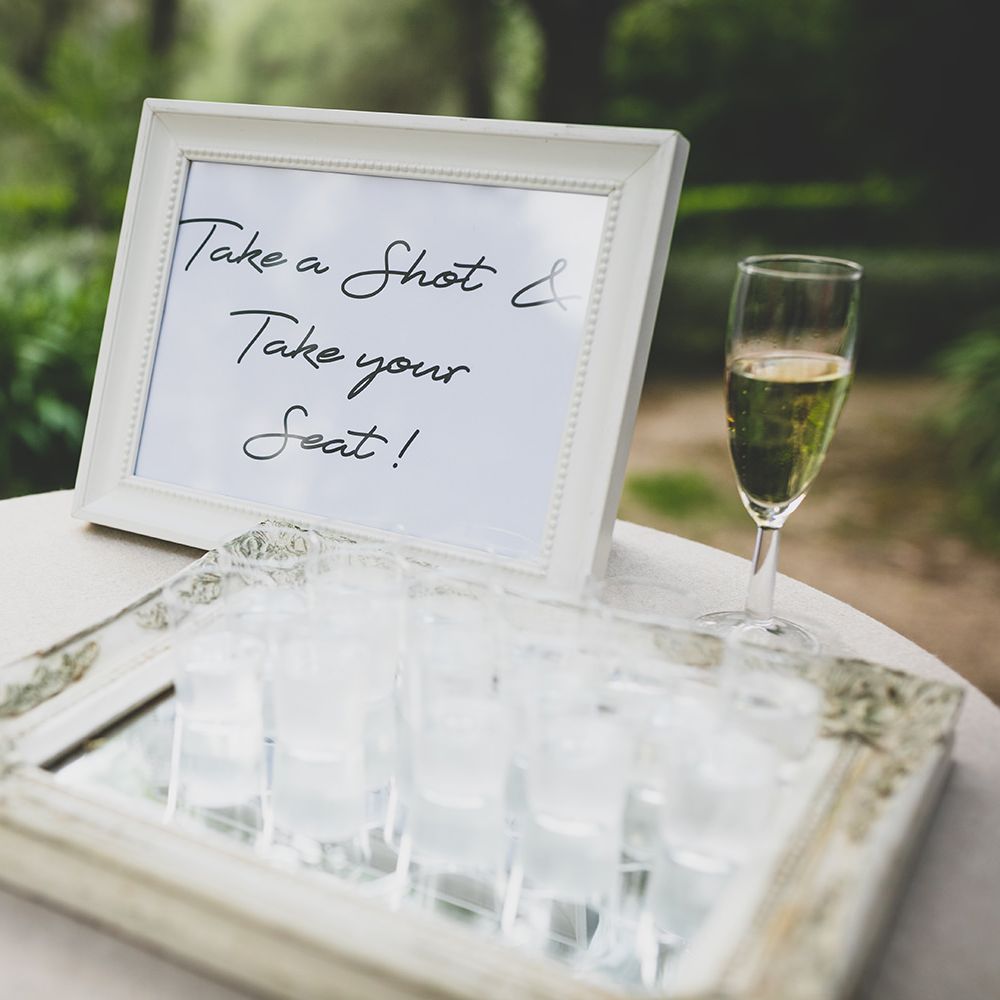Take a shot and take a seat wedding sign