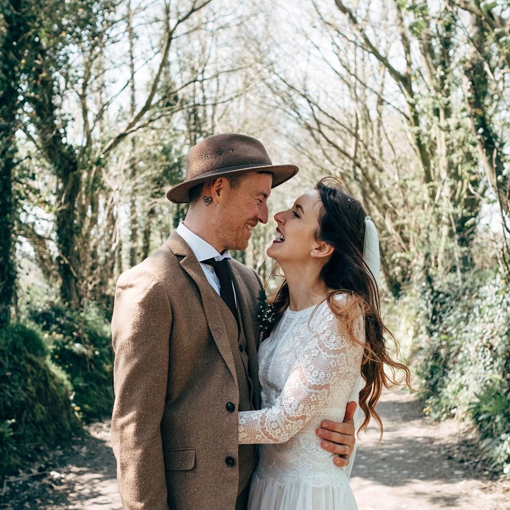 Nancarrow Farm Cornwall Wedding With Images From Dale Weeks &amp; Bride In Maggie Sottero With Wild Flower Bouquet &amp; Hand Knitted Flower Girl Outfit