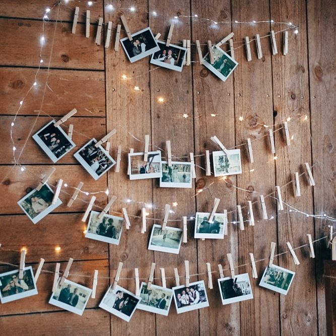 Polaroid Display For Wedding // Nancarrow Farm Cornwall Wedding With Images From Dale Weeks &amp; Bride In Maggie Sottero With Wild Flower Bouquet &amp; Hand Knitted Flower Girl Outfit